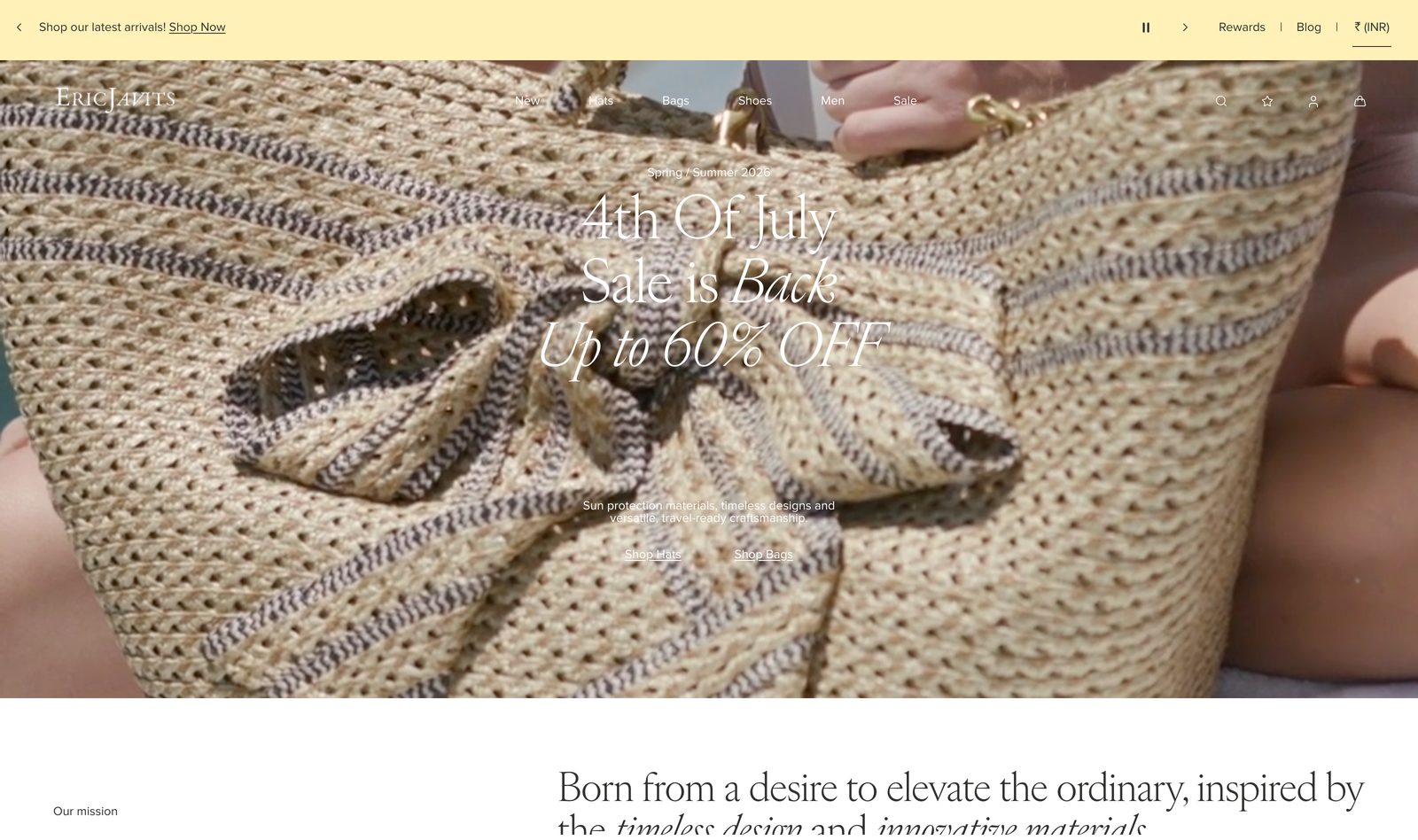 Eric Javits editorial homepage hero with a raffia handbag close-up, a 4th of July sale up to 60 percent off, and the brand line born from a desire to elevate the ordinary