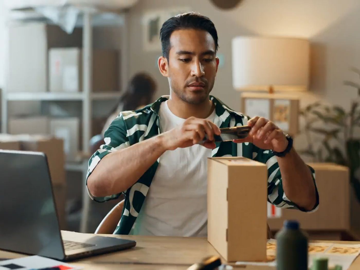 Ecommerce seller preparing an online order, a growing online store